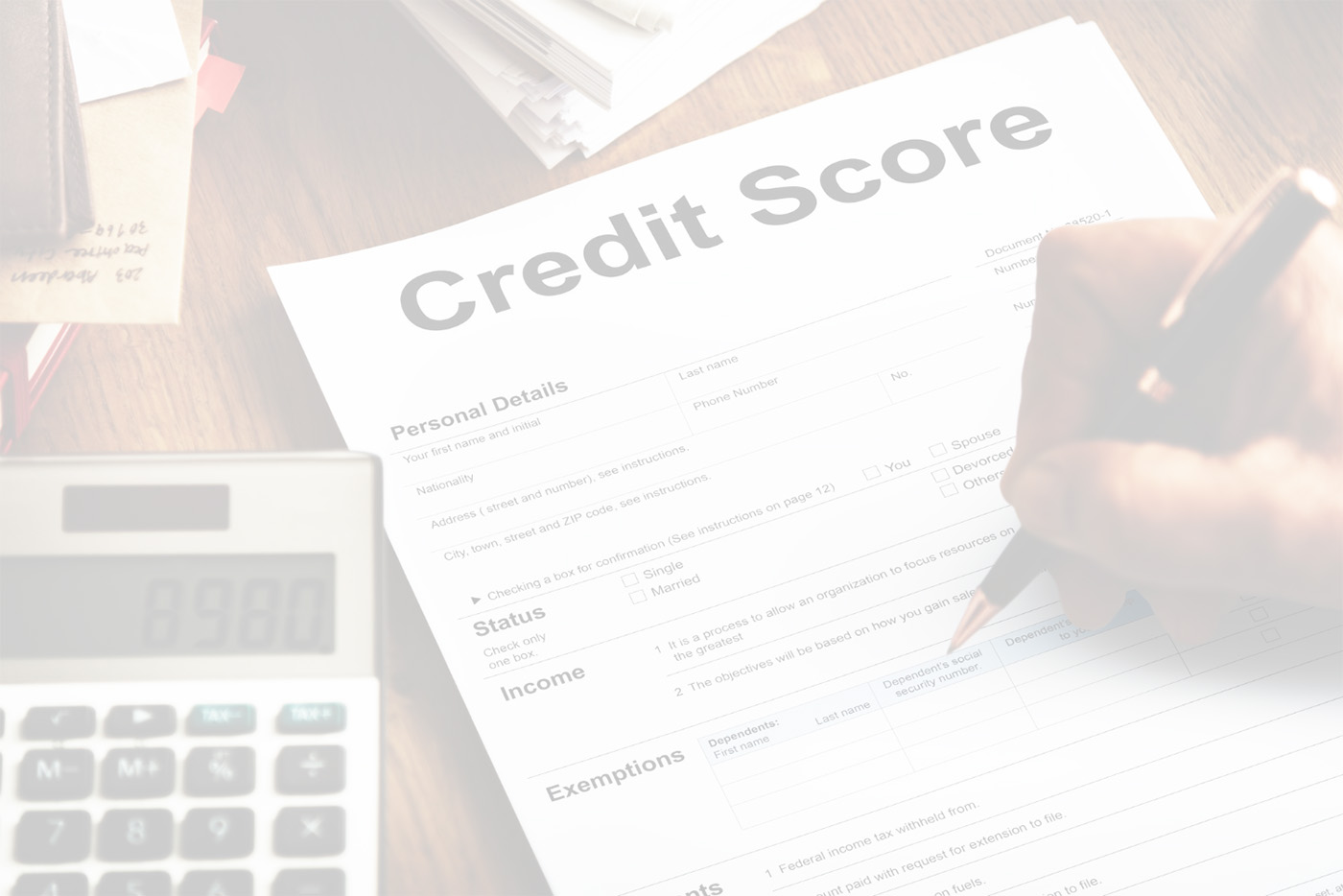Person filling out credit score report