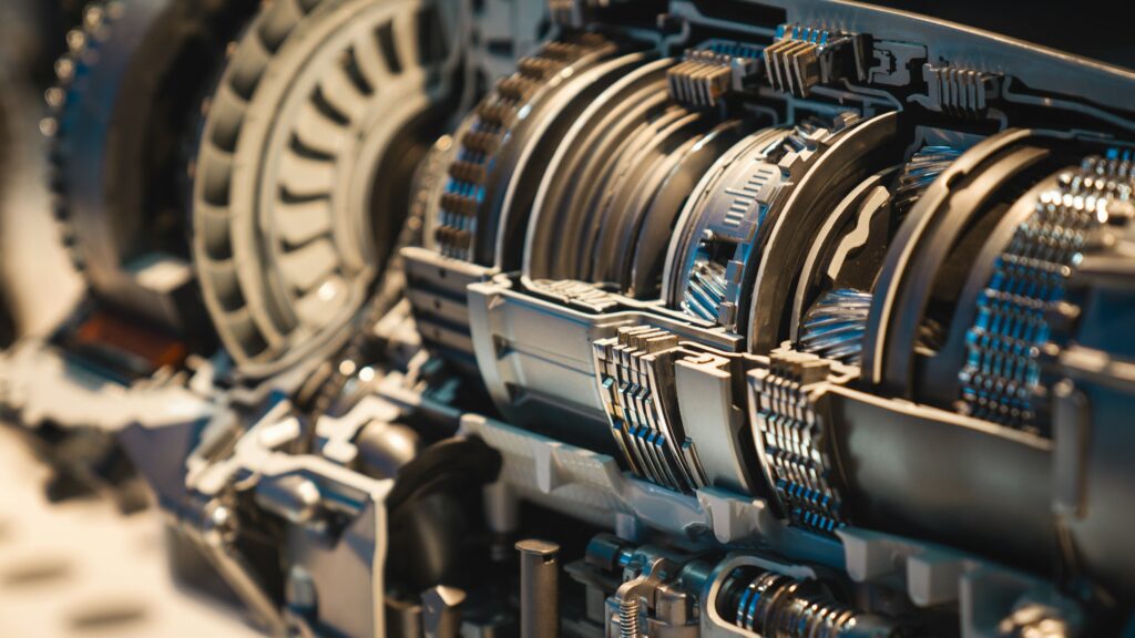 a-close-up-of-a-machine-with-many-gears-stockpack-unsplash