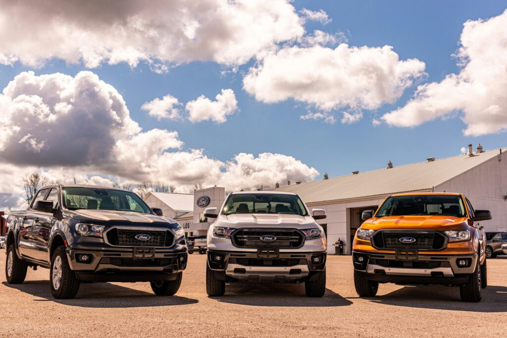 green-and-yellow-chevrolet-car-on-brown-sand-under-blue-and-white-sunny-cloudy-sky-during-stockpack-unsplash