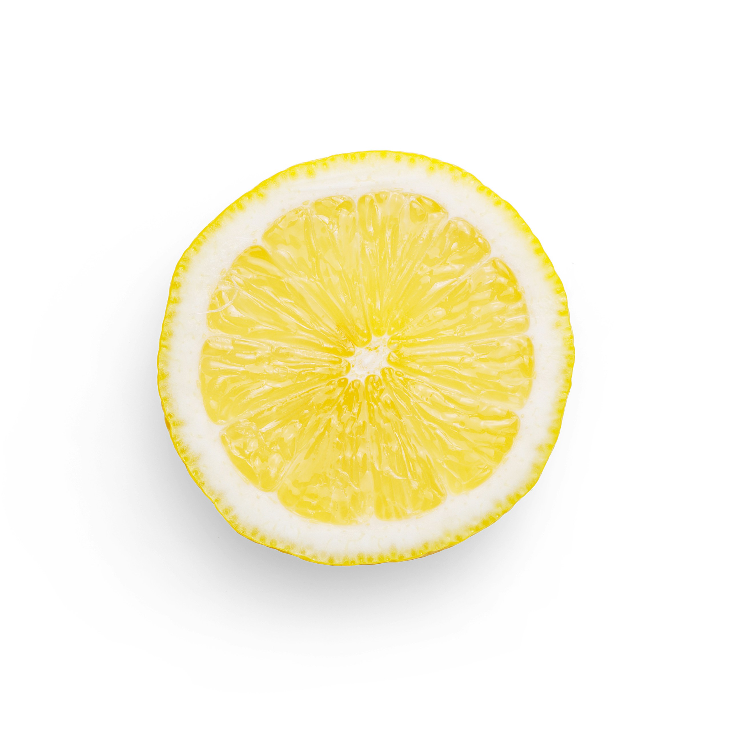 Quality photo of a slice of lemon on a white background
