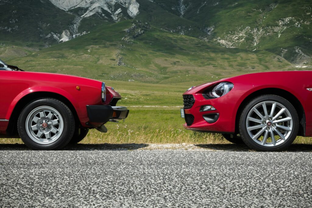 two-red-vehicle-face-each-other-at-daytime-stockpack-unsplash