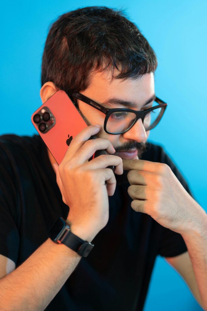 Man with smartphone iPhone Pro Max - Call business man