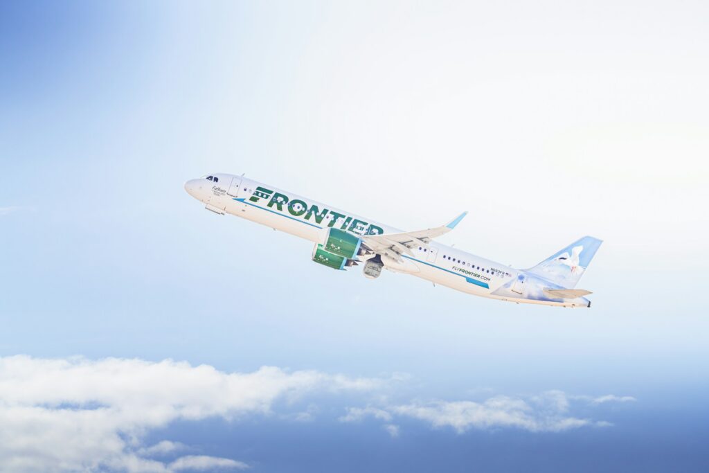 Frontier Airlines Airbus A321neo taking off from Phoenix Sky-Harbor International Airport toward Denver. "Falkner" the Roseate Tern Livery.