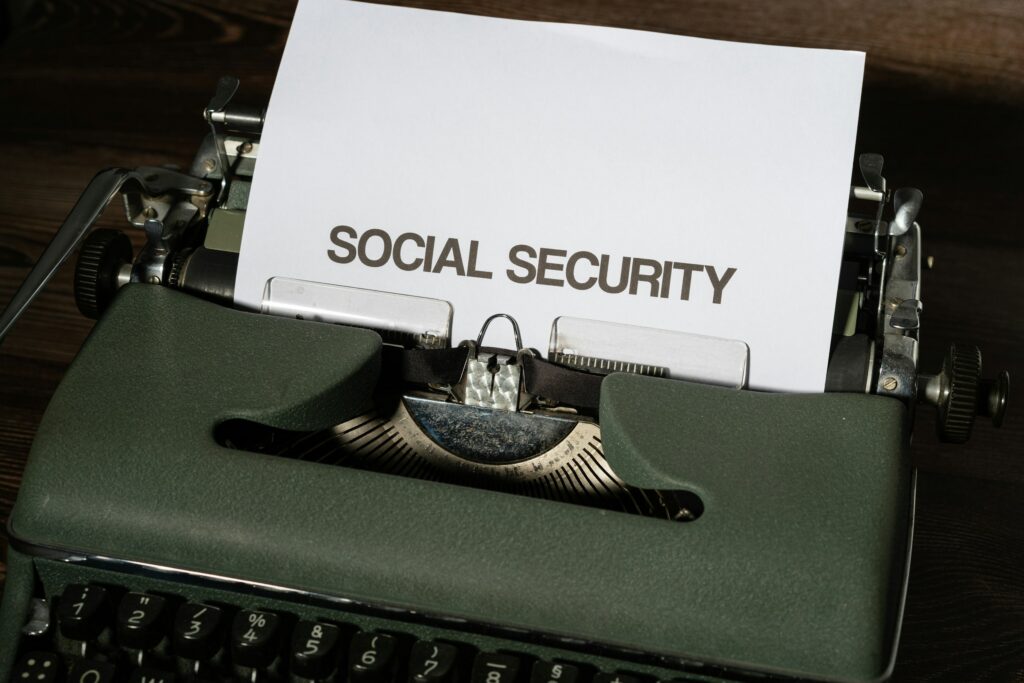 Vintage typewriter with a sheet of paper that reads 'SOCIAL SECURITY' in bold letters