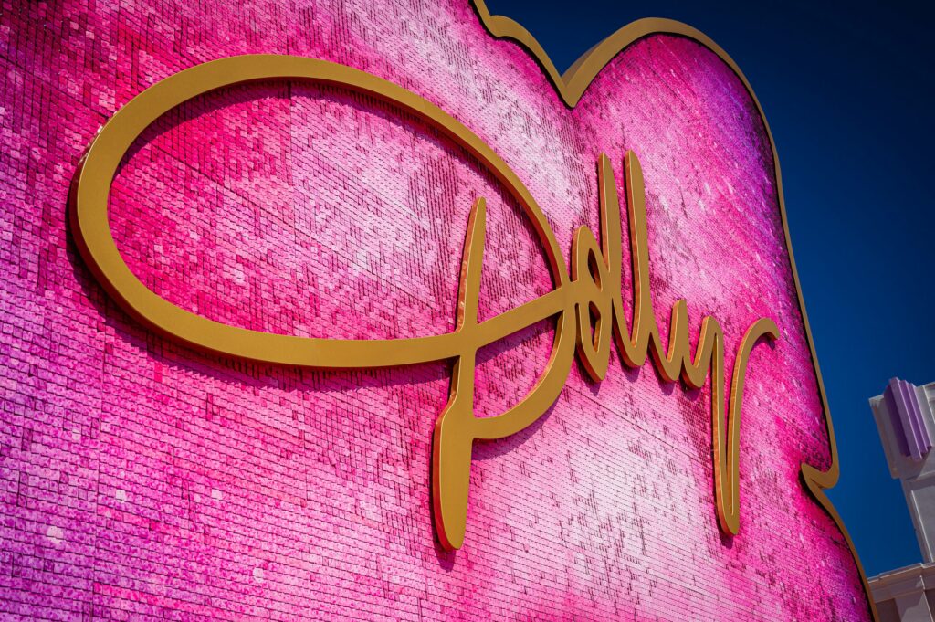 The large sparkling butterfly Dolly Parton facade over the entrance to the attraction Songteller: Dolly's Journey.